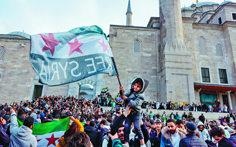 Syrians rejoice as they return to the capital Damascus and ransack the home of President Bashar al-Assad. Agencies Syrians rejoice as they return to the capital Damascus and ransack the home of President Bashar al-Assad. Agencies