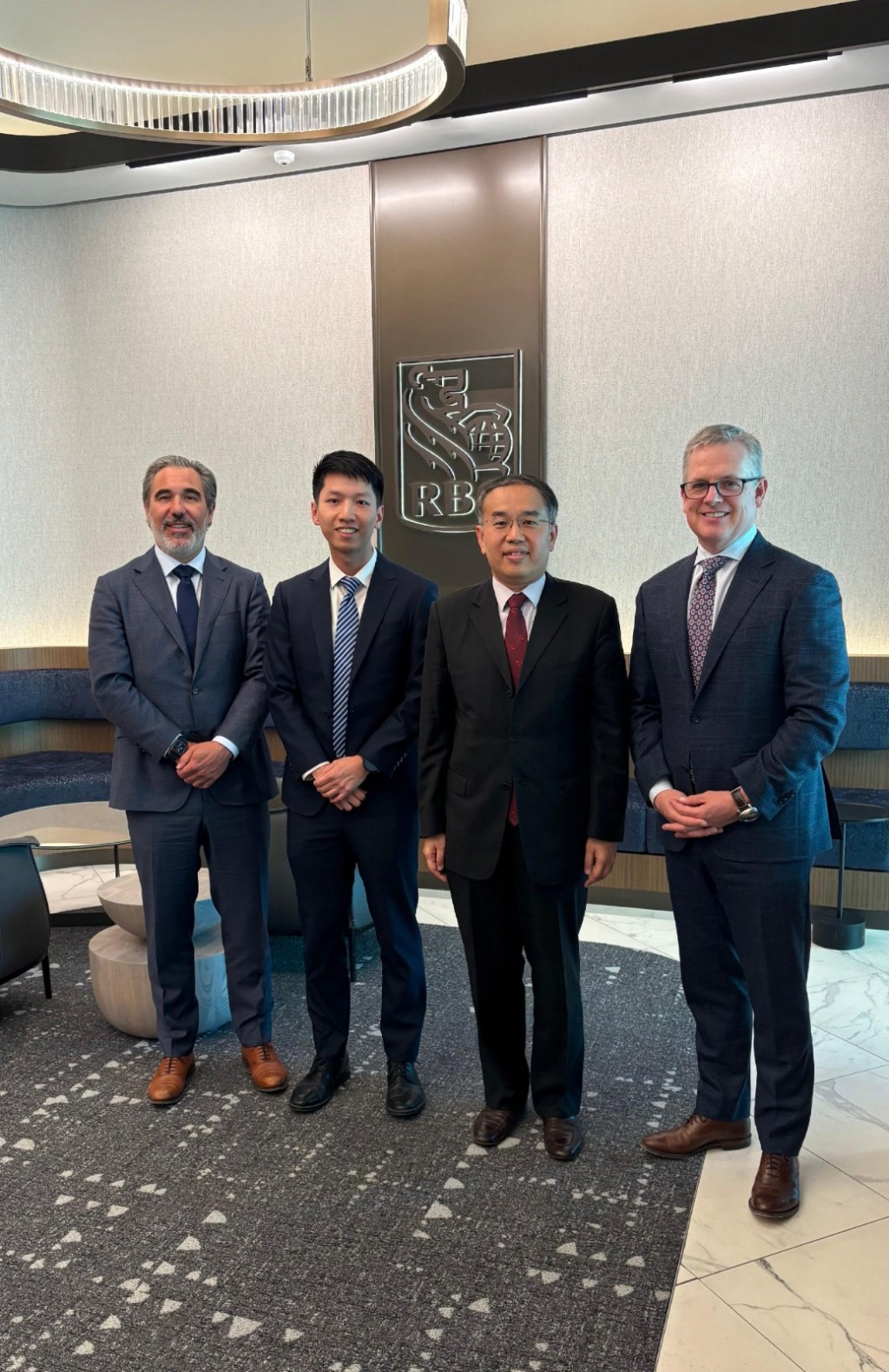 Royal Bank of Canada executive vice president and global head of strategy, products, and digital investing Stuart Rutledge, Hong Kong Economic and Trade Office (Toronto) acting director Gavin Yeung, Christopher Hui, and RBC Wealth Management group head Neil McLaughlin. Photo from GIS