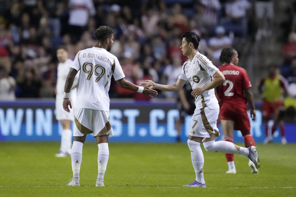Son Heung-Min of Los Angeles FC salutes teammate Denis Bouanga during the MLS match between Chicago Fire FC and Los Angeles Football Club. (AFP)