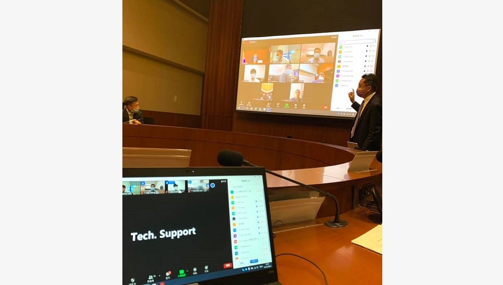 Lawmakers are briefed on Zoom meetings, which Andrew Leung, top inset, says will be informal sessions. Bottom inset: Ben Chan. Lawmakers are briefed on Zoom meetings, which Andrew Leung, top inset, says will be informal sessions. Bottom inset: Ben Chan.