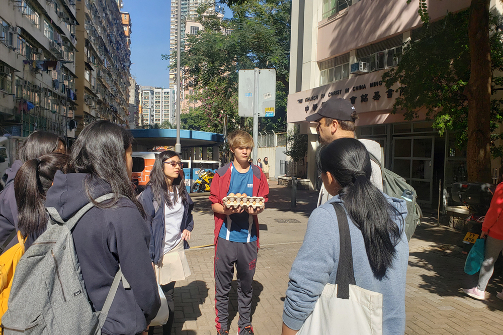 Ben''s participation in service learning and going on ImpactHK Kindness Walks in 2019 before leading the walks himself.