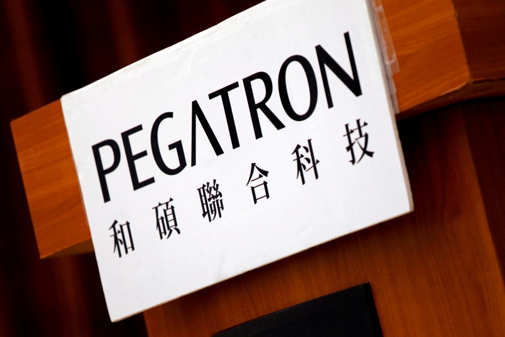 The logo of Pegatron, which assembles electronics from Apple's iPhones, is seen during an annual general meeting in Taipei, Taiwan June 20, 2017. REUTERS