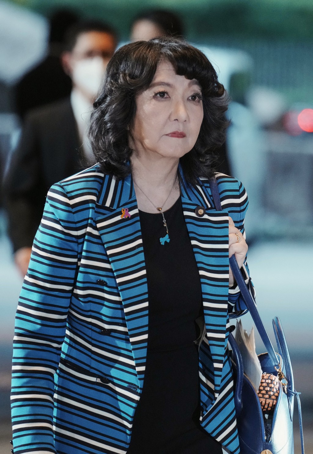 Japan's newly appointed Finance Minister Satsuki Katayama arrives at the prime minister's office in Tokyo on October 21, 2025. (Photo by Kazuhiro NOGI / AFP)