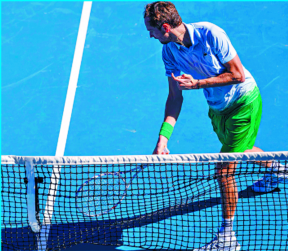 Daniil Medvedev breaks his racket in frustration. AFP Daniil Medvedev breaks his racket in frustration. AFP