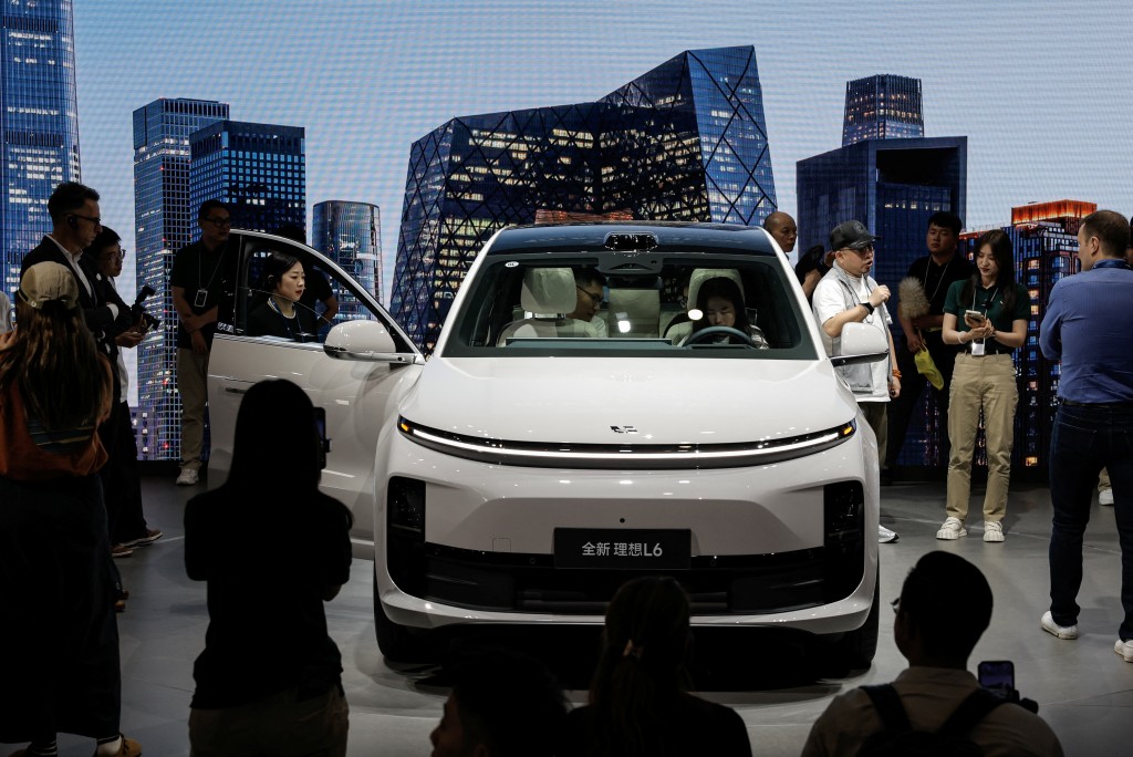 A Li L6 by Li Auto is displayed at its booth during the Beijing International Automotive Exhibition, or Auto China 2024, in Beijing, China, April 25, 2024. REUTERS/Tingshu Wang