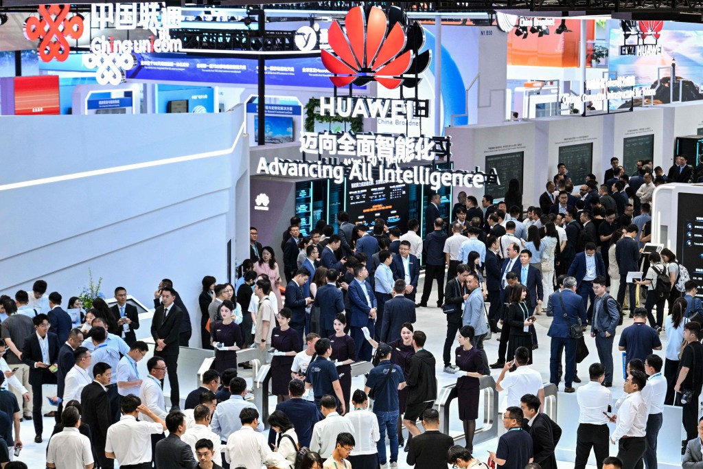 People visit the Huawei booth during the Mobile World Congress (MWC) in Shanghai on June 24, 2026. AFP