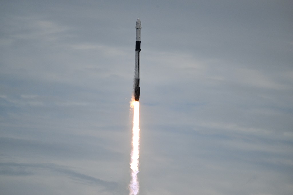Photo by CHANDAN KHANNA / AFP SpaceX Falcon 9 rocket topped with the Crew Dragon capsule lifts off for NASA's SpaceX Crew-13 mission from Space Launch Complex 40 at Cape Canaveral, Florida on October 1, 2026.