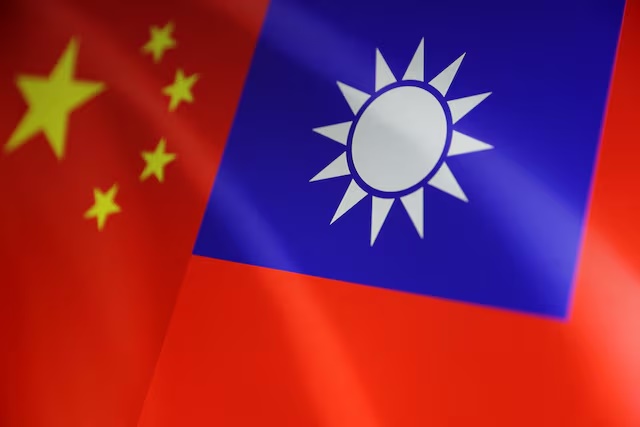 Chinese and Taiwanese flags are seen in this illustration, August 6, 2022. REUTERS/Dado Ruvic/Illustration/File Photo Chinese and Taiwanese flags are seen in this illustration, August 6, 2022. REUTERS/Dado Ruvic/Illustration/File Photo