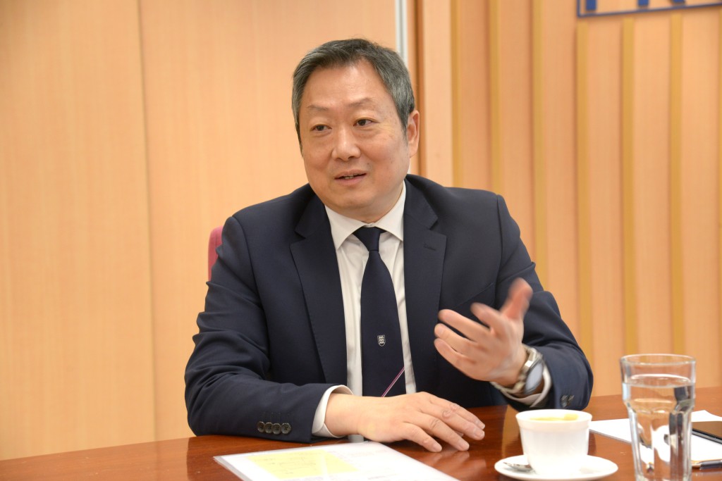 Kelvin Wong. SING TAO