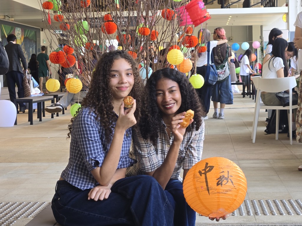 Diana, left, and Marcelle pursue studies at HKBU and have secured full scholarships.