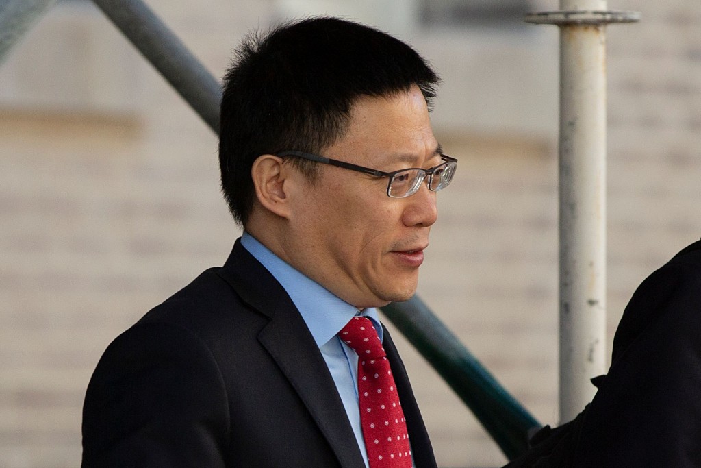 China's Vice Finance Minister Liao Min leaves after deputy-level US-China trade talks in Washington, DC, on September 19, 2019. AFP