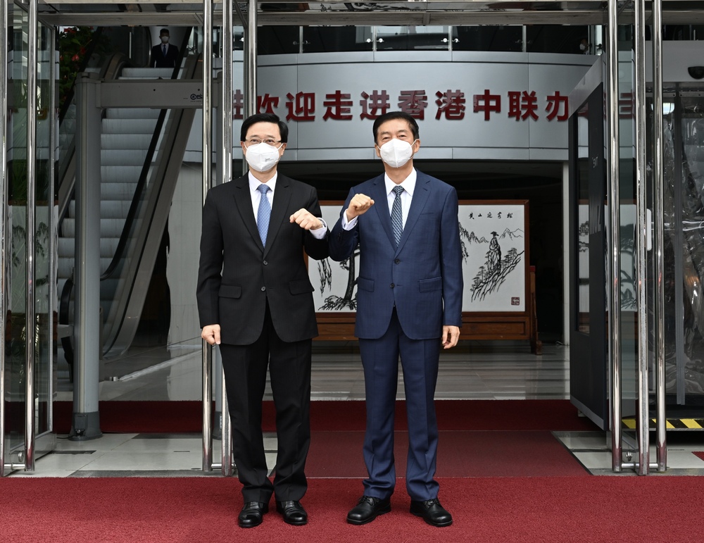 John Lee (L) and Luo Huining (R). (File) John Lee (L) and Luo Huining (R). (File)