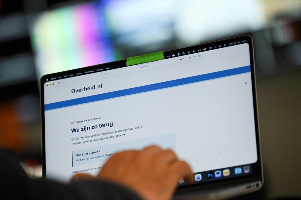 A screen displays the unavailable Dutch government website, mijn.overheid.nl, as cyber agencies warn that websites may be taken offline while PHP prepares a critical fix, in Berlin, Germany, October 21, 2026. REUTERS/Annegret Hilse
