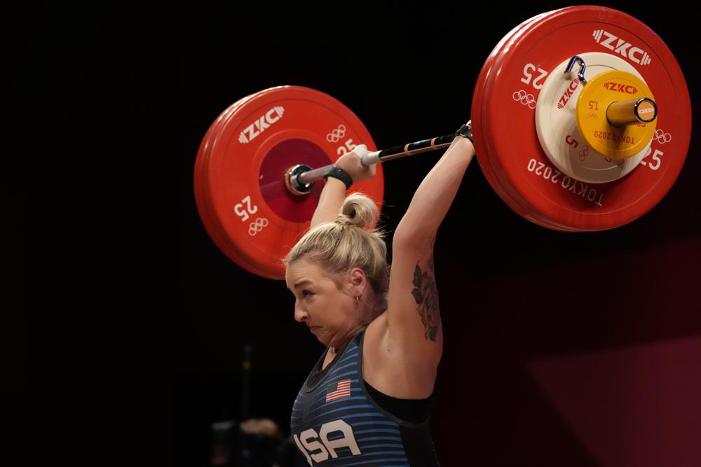 Katherine Elizabeth Nye of the United States competes in the women's 76kg weightlifting event, at the 2020 Summer Olympics, Sunday, Aug. 1, 2021, in Tokyo, Japan. Katherine Elizabeth Nye of the United States competes in the women's 76kg weightlifting event, at the 2020 Summer Olympics, Sunday, Aug. 1, 2021, in Tokyo, Japan.