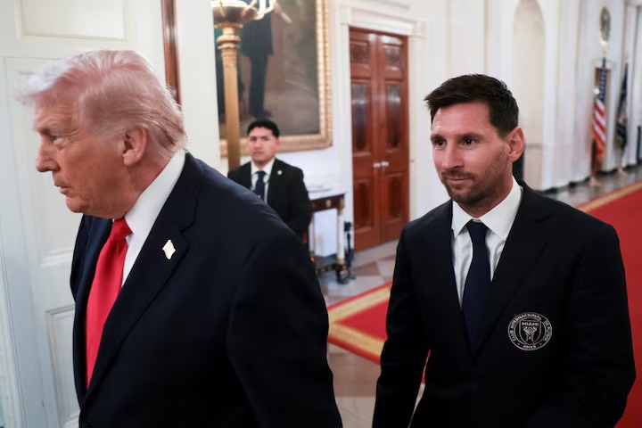 U.S. President Donald Trump arrives with Inter Miami CF captain Lionel Messi on the day he honors reigning Major League Soccer (MLS) champion Inter Miami CF players and team officials with an event in the East Room of the White House in Washington, D.C., U.S., March 5, 2026. REUTERS/Jonathan Ernst 