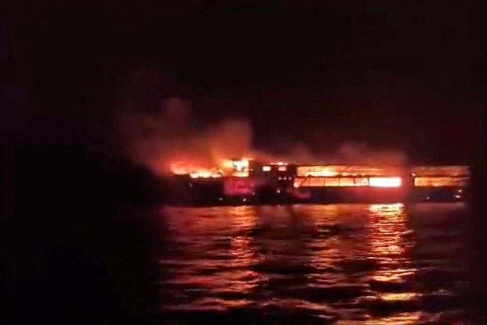 MV June Aster burns as flames and smoke rise after a fire broke out on the ferry, off the coast of Palawan, Philippines, in this screengrab taken from a handout video released on September 9, 2026. Philippine Coast Guard/Handout via REUTERS