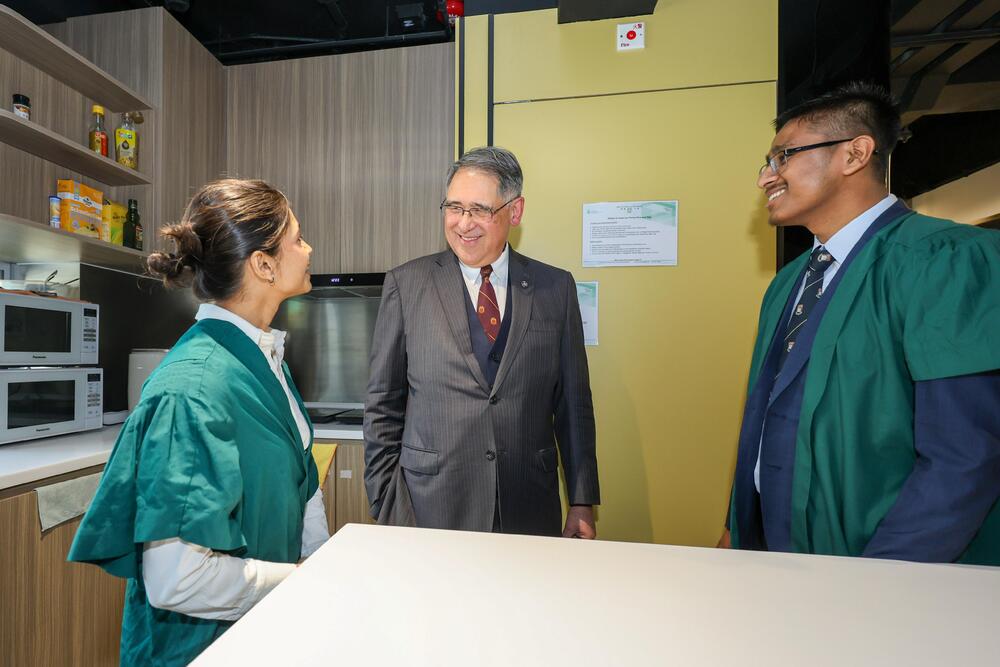 Guests tour the Jockey Club Student Village IV.