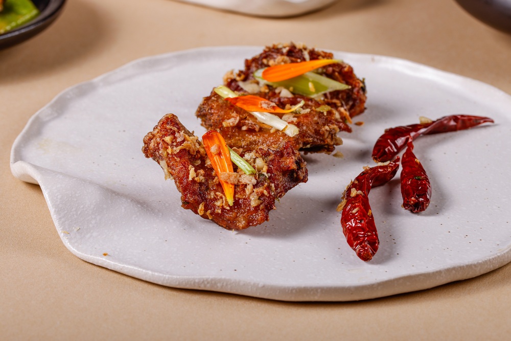 Marinated and deep-fried snake meat paired with fragrant lemongrass and spices, such an innovative Thai method offering a sweet and crispy flavor.