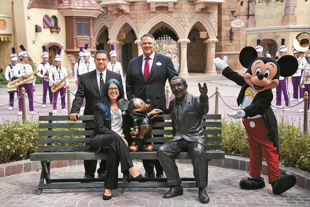 Hong Kong Disneyland managing director Michael Moriarty, right, at the unveiling with Ali Rubinstein, Senior Vice President, Executive Global Management of Creative Development at Walt Disney Imagineering, and Edward Ovalle, Archives Manager at Walt Disney Archives.