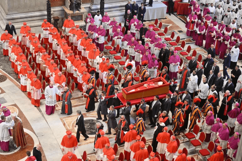 The coffin with the body of Pope Francis is carried into St. Peter's Basilica, where he will lie in state, at the Vatican [Alessandro di Meo/Pool/Reuters]