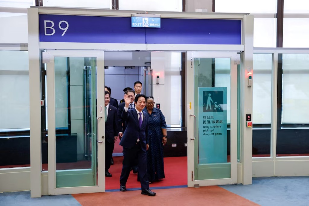 Taiwan President Lai Ching-te, accompanied by Deputy Prime Minister of the Kingdom of Eswatini Thulisile Dladla, arrives at a press conference upon returning from Eswatini, at Taoyuan International Airport, in Taoyuan, Taiwan, May 5, 2026. REUTERS/Ann Wang