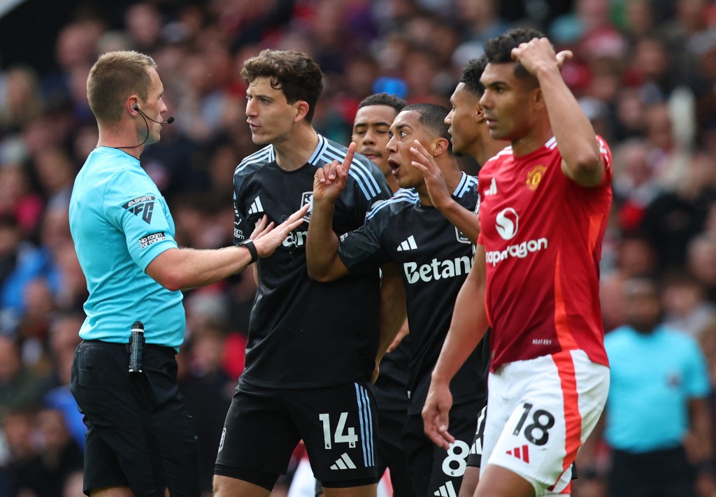 Aston Villa's Pau Torres and Youri Tielemans remonstrate with referee Thomas Bramall after Aston Villa's Morgan Rogers had his goal disallowed after a VAR review. (Reuters)