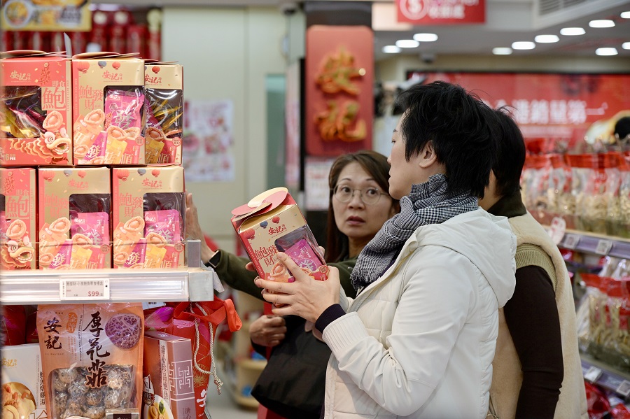 Retailers are hoping that shoppers will loosen their purse strings over the Lunar New Year. SING TAO