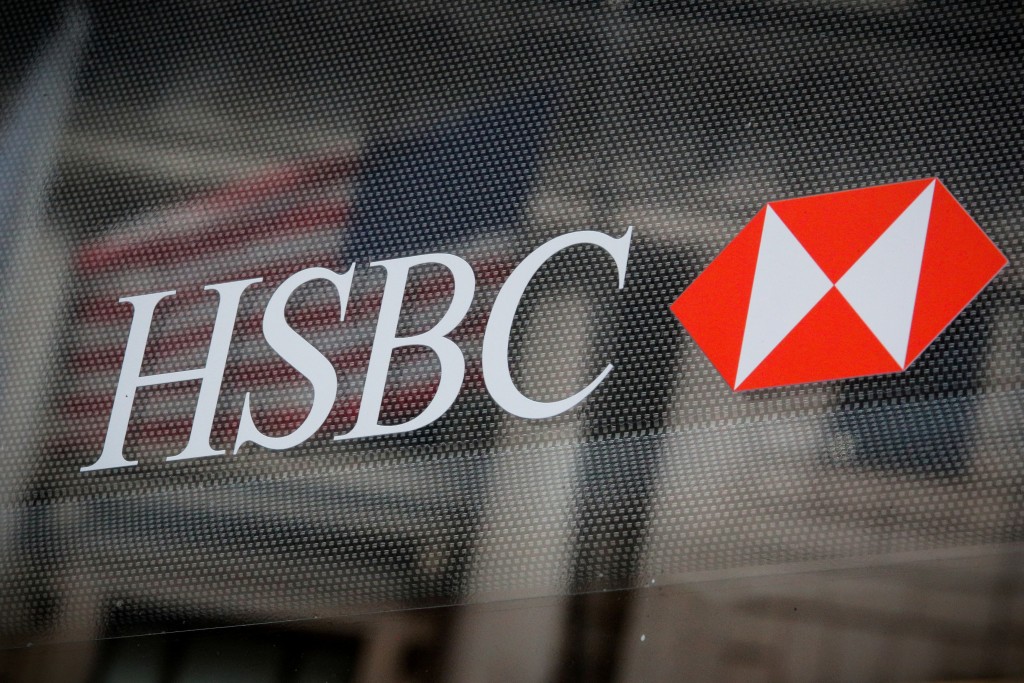 HSBC logo is seen on a branch bank in the financial district in New York, U.S., August 7, 2019. REUTERS/Brendan McDermid/File Photo