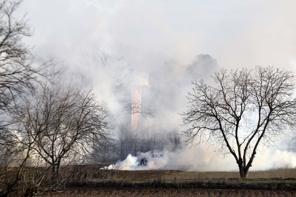 Greek riot police are seen through smoke during clashes at the Greek-Turkish border in Kastanies, Evros region, on Friday, March 6. Thousands of refugees and other asylum-seekers have tried to enter Greece since Turkey opened its border. Greek riot police are seen through smoke during clashes at the Greek-Turkish border in Kastanies, Evros region, on Friday, March 6. Thousands of refugees and other asylum-seekers have tried to enter Greece since Turkey opened its border.
