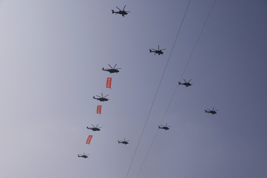 Helicopters fly in formation over Tiananmen Square during a military parade to mark the 80th anniversary of the end of World War Two, in Beijing, China, September 3, 2025. (Reuters)
