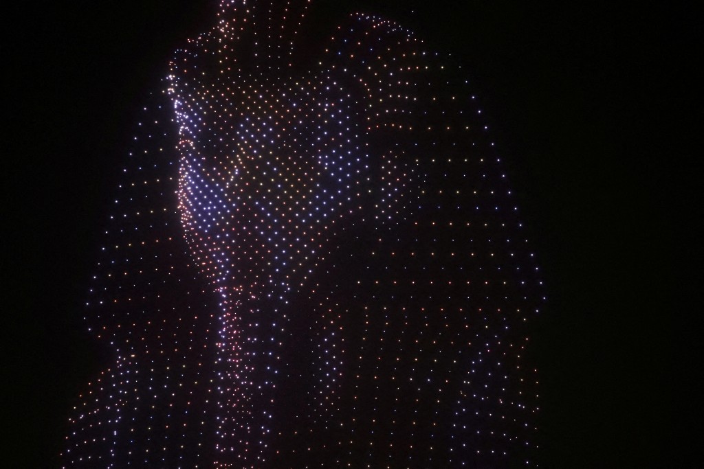 A drone light show depicts the mask of ancient pharaoh king Tutankhamen during the opening ceremony of the Grand Egyptian Museum (GEM), near the Giza pyramid complex, in Giza, Egypt, November 1, 2025. (Reuters)