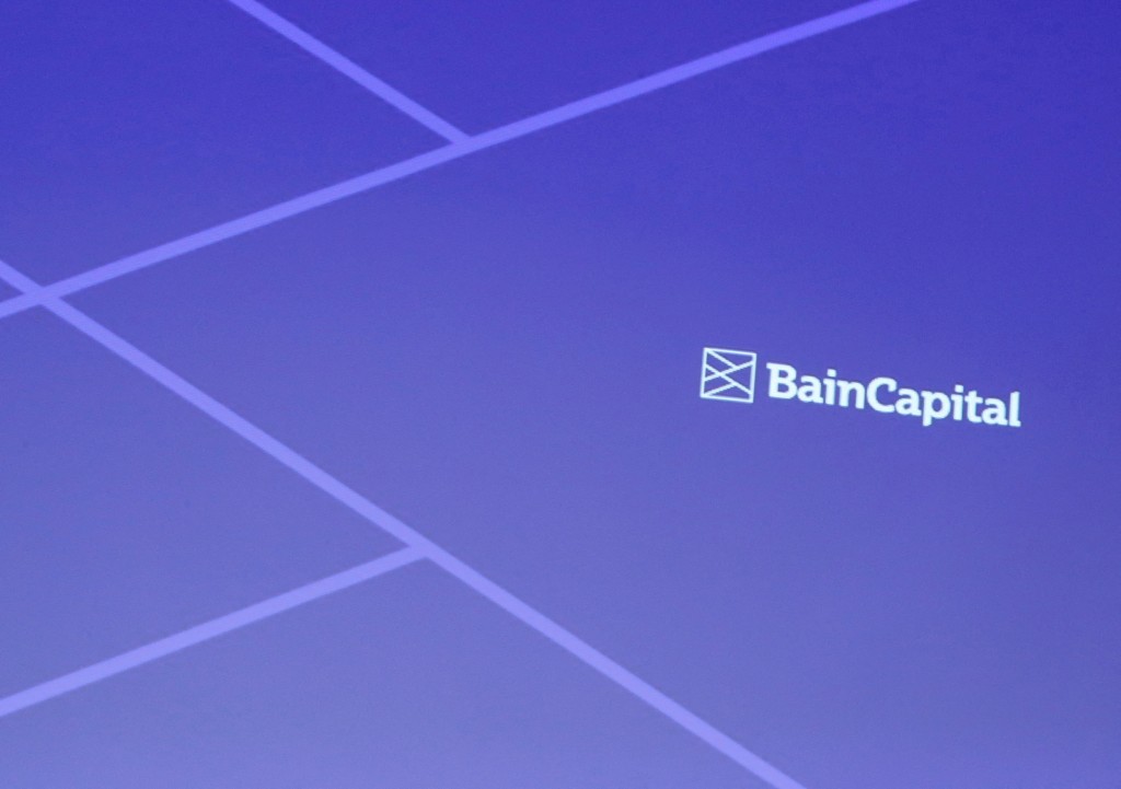 Logo of Bain Capital is screened at a news conference in Tokyo, Japan September 28, 2017. REUTERS
