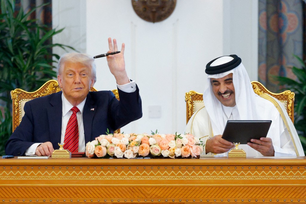U.S. President Donald Trump and Qatar's Emir Tamim bin Hamad Al Thani attend a signing ceremony in Doha, Qatar, May 14, 2025. (Reuters)