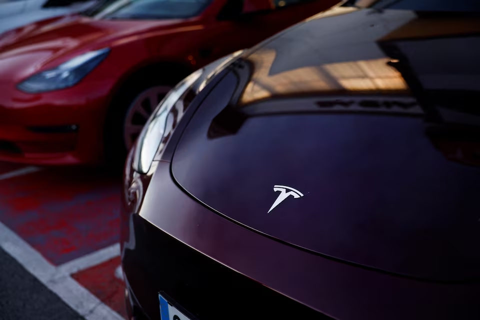 Tesla electric vehicles are lined up at a dealership in Durango, northern Spain. (Reuters)