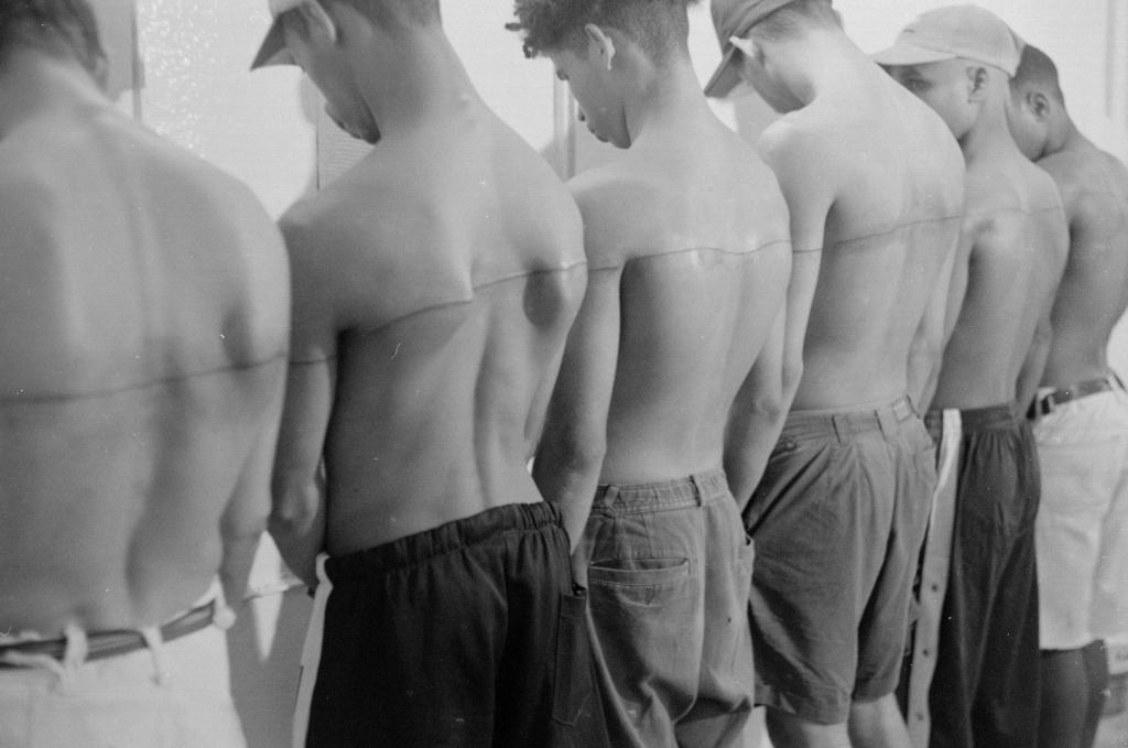 Santiago Sierra, 250 cm Line Tattooed on Six Remunerated People