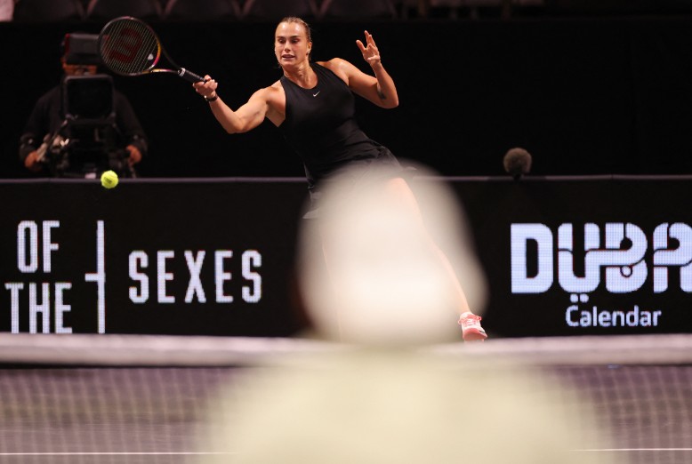 Aryna Sabalenka plays a forehand against Nick Kyrgios during their 'Battle of the Sexes' match. AP