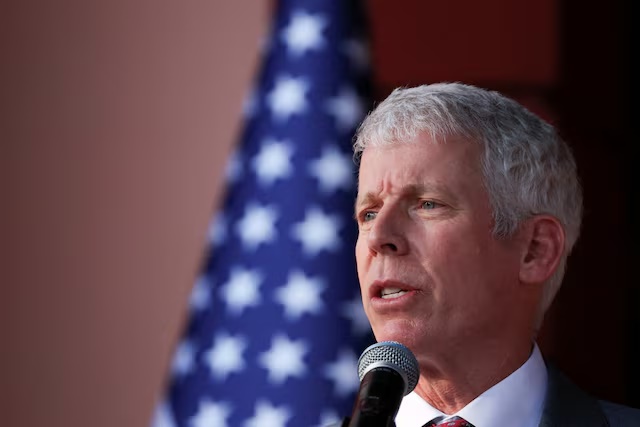 U.S. Energy Secretary Chris Wright and Venezuela's interim President Delcy Rodriguez, not pictured, speak with the media after attending a meeting, marking the highest-level U.S. visit focused on energy policy to the OPEC nation in nearly three decades, as Washington conducts its first on-the-ground assessment of the oil industry it aims to help rebuild, in Caracas, Venezuela, February 11, 2026. REUTERS/Leonardo Fernandez Viloria