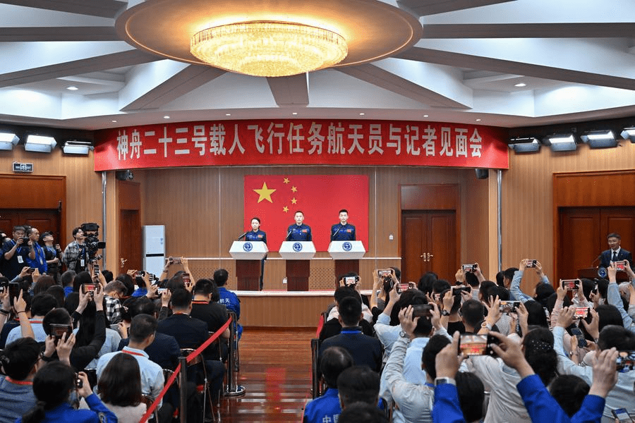 Chinese astronauts Zhu Yangzhu (C), Zhang Zhiyuan (R) and Li Jiaying, or Lai Ka-ying in Cantonese, for the upcoming Shenzhou-23 crewed spaceflight mission, meet the press at the Jiuquan Satellite Launch Center in northwest China, May 23, 2026. (Xinhua/Li Zhipeng)