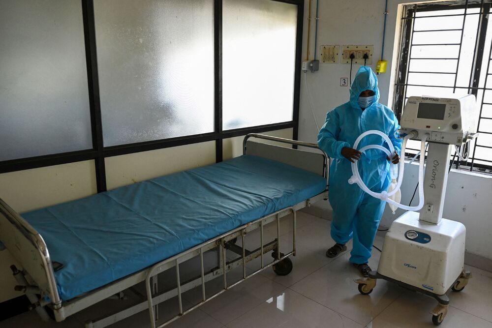 A medical staff prepares an isolation ward for Covid-19 patients at a government hospital in Chennai in April. (AFP) A medical staff prepares an isolation ward for Covid-19 patients at a government hospital in Chennai in April. (AFP)