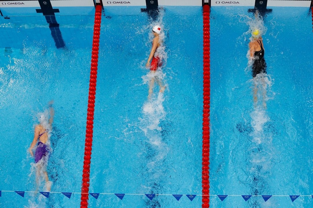 Tokyo 2020 Olympics - Swimming - Mixed 4 x 100m Medley Relay - Heats. REUTERS/Antonio Bronic Tokyo 2020 Olympics - Swimming - Mixed 4 x 100m Medley Relay - Heats. REUTERS/Antonio Bronic