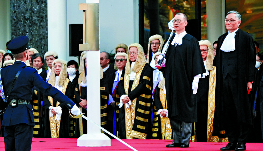 Andrew Cheung, far right, says the 'orchestrated harassment and pressures to which some of our overseas judges have recently been subjected are deplorable.' SING TAO