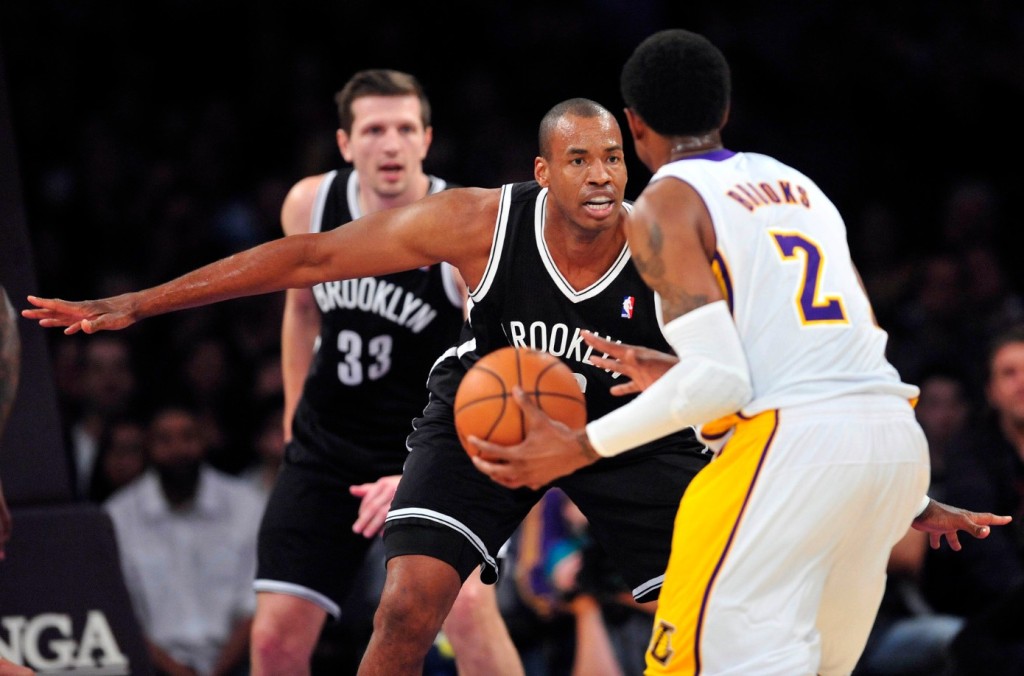 Jason Collins in action for the Brooklyn Nets against the Los Angeles Lakers in 2014. REUTERS