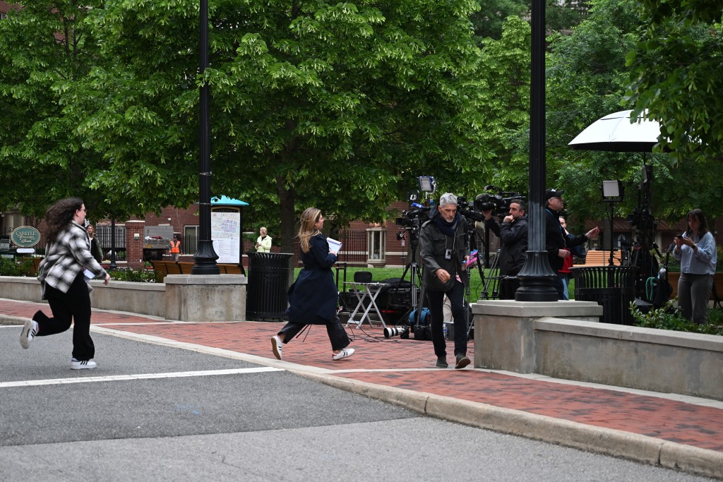 Photo by ALEX WROBLEWSKI / AFP. Reporters are seen outside the US District Court for the Eastern District of Virginia after he appeared in court in Alexandria, Virginia, on April 29, 2026.