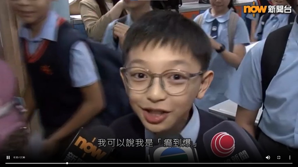 Chu could hardly hide his excitement as he spoke to reporters after being allocated to Wah Yan College, Kowloon. (Scrrengrab from Now News)