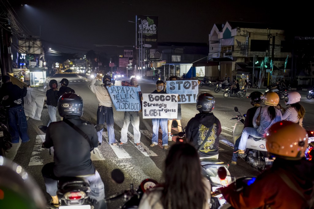 Photo by ADITYA AJI / AFP This picture taken on August 1, 2026 shows a group of youths calling themselves "Bogor Bersih LGBT (Bogor Clean LGBT)" taking part in an anti-LGBTQ rally on a road in Bogor, West Java.