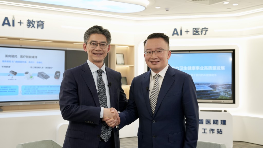 Dr Tao Xiaodong, Executive Director of iFLYTEK - Xunfei Healthcare Tech (L) and program host Nick Chan (R).