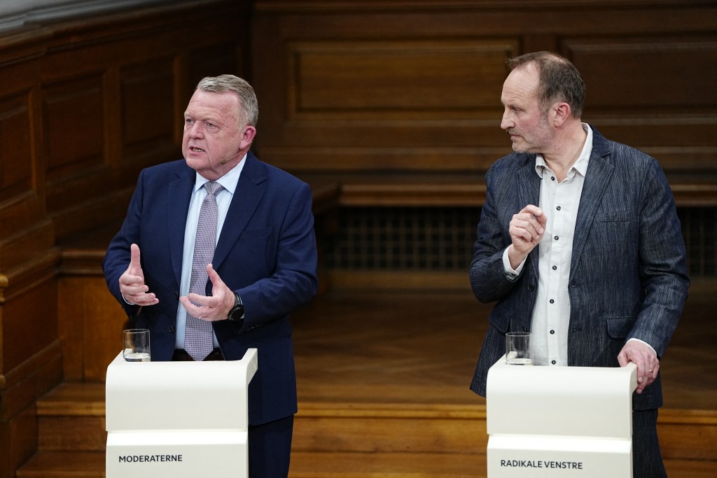 Leader of the Social Liberal Party, Martin Lidegaard (R) and Lars Loekke Rasmussen, Denmark's Foreign Minister and Chairman of the Moderates take part in TV2's party leader debate 'The Last Answer' in the Common Hall at Christiansborg in Copenhagen, as election campaigning continues on March 23, 2026, the eve of the parliamentary election in Denmark. (Photo by Mads Claus Rasmussen / Ritzau Scanpix / AFP)