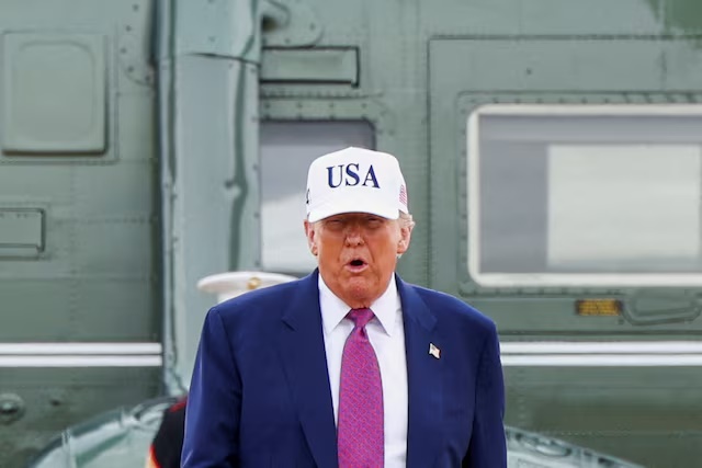 U.S. President Donald Trump steps out of Marine One for a visit to Fort Bragg to mark the U.S. Army anniversary, in North Carolina, U.S., June 10, 2025. REUTERS/Evelyn Hockstein 