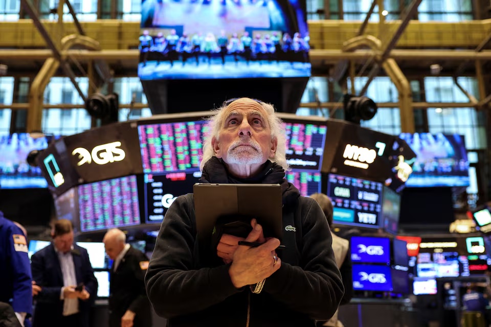 A trader works on the floor at the New York Stock Exchange (NYSE) in New York City, U.S. (Reuters)