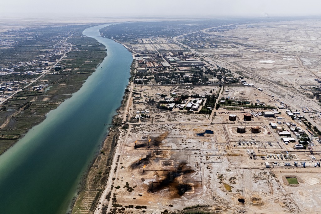 This aerial photograph shows the Nahr Bin Umar Oil and Gas Field on the outskirts of the southern Iraqi city of Basra on April 29, 2026. (AFP)